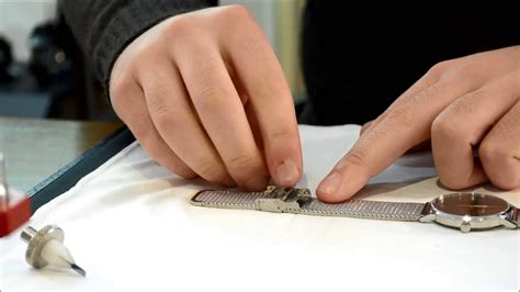 como ajustar la correa de un reloj rolex